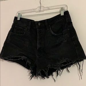 AGOLDE size 29 black distressed jean shorts